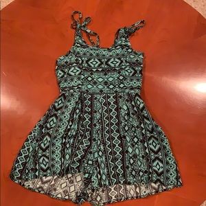 Green and black romper